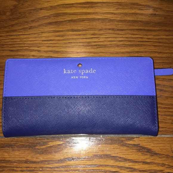 kate spade Handbags - Kate Spade Laurel Way button wallet